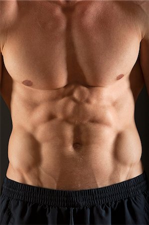 stomach fitness - Barechested muscular man, mid section Stock Photo - Premium Royalty-Free, Code: 632-06317862