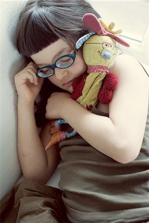 simsearch:632-05553588,k - Girl napping with stuffed toy Stock Photo - Premium Royalty-Free, Code: 632-06317886