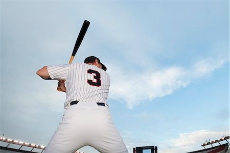 Baseball player preparing to bat, rear view Stock Photo - Premium Royalty-Free, Code: 632-06318065