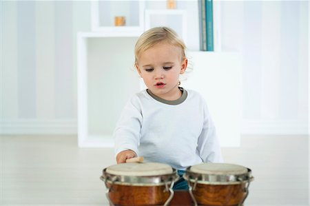 simsearch:632-06779368,k - Baby boy playing drums Stock Photo - Premium Royalty-Free, Code: 632-06354246