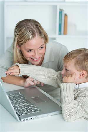 simsearch:632-05759727,k - Mother and son using laptop computer together Stock Photo - Premium Royalty-Free, Code: 632-06354290