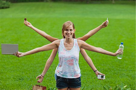 people juggling - Young woman multitasking Stock Photo - Premium Royalty-Free, Code: 632-06353964