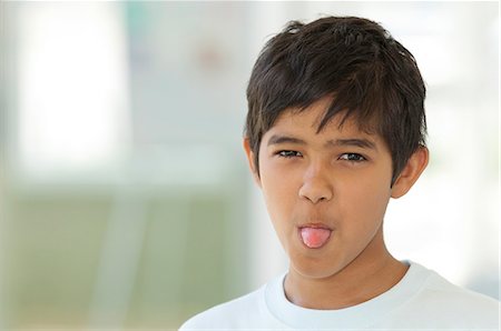 simsearch:632-09021638,k - Boy sticking out tongue, portrait Stock Photo - Premium Royalty-Free, Code: 632-06404272