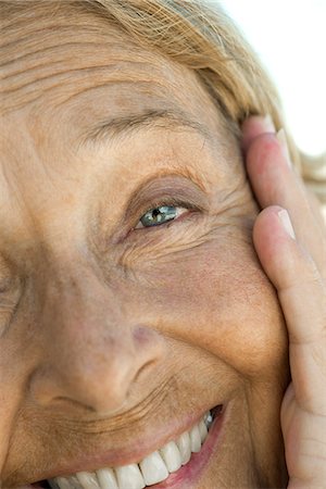 eye senior - Senior woman smiling, close-up portrait Stock Photo - Premium Royalty-Free, Code: 632-06404483
