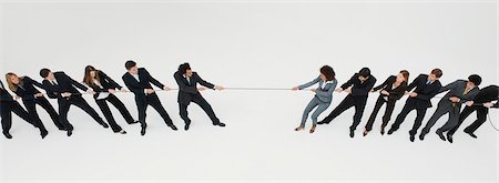 rope - Business professionals in tug-of-war match Stock Photo - Premium Royalty-Free, Code: 632-06404638