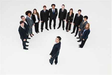 CEO meeting with team of business associates Stock Photo - Premium Royalty-Free, Code: 632-06404632