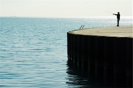 simsearch:632-06404764,k - Pêche au saumon sur la rive du lac Michigan, Chicago Lake View Photographie de stock - Premium Libres de Droits, Code: 632-06404739