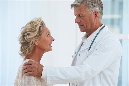 physician with older male - Doctor comforting patient Stock Photo - Premium Royalty-Free, Code: 632-06779145