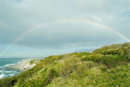 rainbow landscape not person - Rainbow on the cliffs of Ciboure, France Photographie de stock - Premium Libres de Droits, Code: 632-06779234