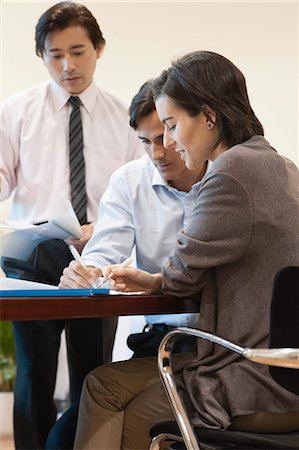 simsearch:695-03380508,k - Colleagues working together in office Stock Photo - Premium Royalty-Free, Code: 632-06967572