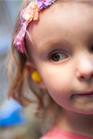 Little girl with headband, cropped Stock Photo - Premium Royalty-Free, Code: 632-06967658