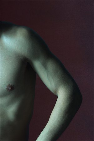 Man's bare chest and arm, cropped Foto de stock - Sin royalties Premium, Código: 632-07161421