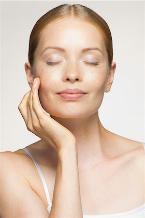 Young woman enjoying soft and smooth results of proper skin care Stock Photo - Premium Royalty-Free, Code: 632-07161507