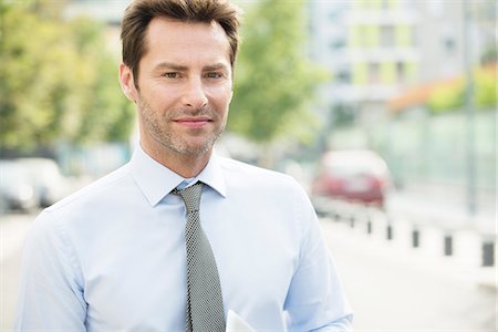 portrait 40 year old man serious straight on - Businessman, portrait Stock Photo - Premium Royalty-Free, Code: 632-07161626