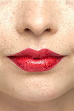 simsearch:632-07494975,k - Young woman wearing bright red lipstick, portrait Foto de stock - Royalty Free Premium, Número: 632-07494969