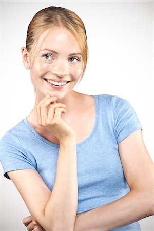 Young woman daydreaming, portrait Stock Photo - Premium Royalty-Free, Code: 632-07540046