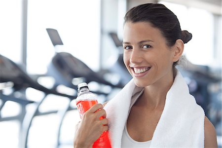 fitness woman healthy food - Woman hydrating after working out Stock Photo - Premium Royalty-Free, Code: 632-07674583