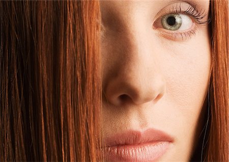 simsearch:632-08130078,k - Woman's face and red hair, portrait Photographie de stock - Premium Libres de Droits, Code: 632-07674732