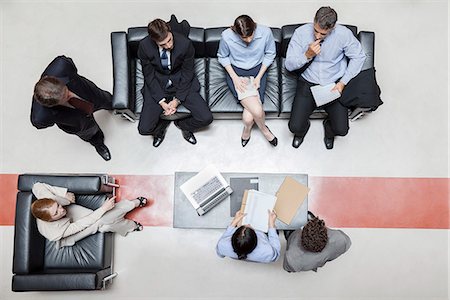 Executives in meeting, overhead view Photographie de stock - Premium Libres de Droits, Code: 632-07809426