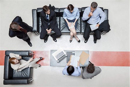 simsearch:632-08698428,k - Executives in meeting, overhead view Stock Photo - Premium Royalty-Free, Code: 632-07809426