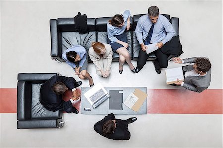 simsearch:632-06404698,k - Executives in meeting, overhead view Stock Photo - Premium Royalty-Free, Code: 632-07809423