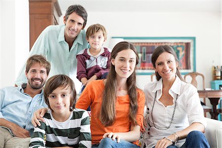 family and friends - Family together in living room, portrait Stock Photo - Premium Royalty-Free, Code: 632-07849462