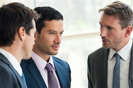 simsearch:632-08698428,k - Businessmen talking together Stock Photo - Premium Royalty-Free, Code: 632-08001846