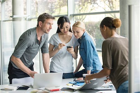 designers brainstorming in creative office meeting - Colleagues collaborating Stock Photo - Premium Royalty-Free, Code: 632-08129753