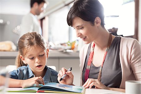 simsearch:6111-06838730,k - Mother and young daughter reading together Stock Photo - Premium Royalty-Free, Code: 632-08129922