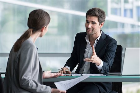 financial advisor talking with clients - Businessman meeting with client Stock Photo - Premium Royalty-Free, Code: 632-08129936