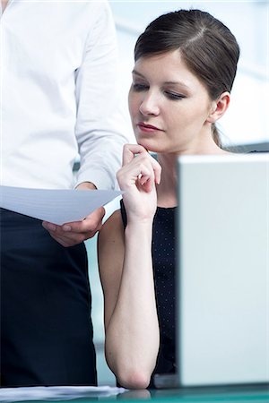 simsearch:632-05553837,k - Colleagues collaborating in office Stock Photo - Premium Royalty-Free, Code: 632-08130007