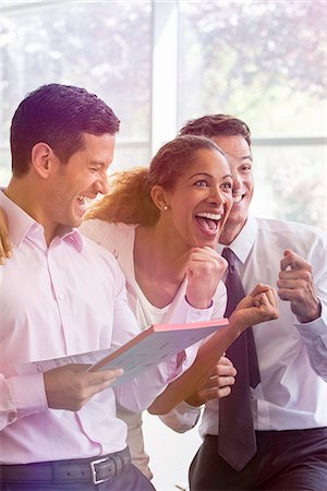 Office workers sharing lighthearted moment together Photographie de stock - Premium Libres de Droits, Code: 632-08130028