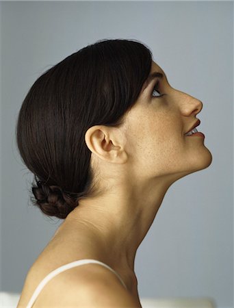 Woman looking up, smiling, profile Foto de stock - Sin royalties Premium, Código: 632-08130105