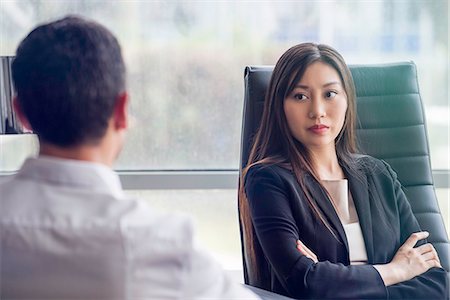 diverse coworkers - Businesswoman meeting with associate Stock Photo - Premium Royalty-Free, Code: 632-08130152