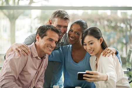 relaxed middle aged business - Friends posing together for selfie Stock Photo - Premium Royalty-Free, Code: 632-08130264