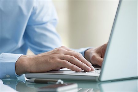 Man using laptop computer Stockbilder - Premium RF Lizenzfrei, Bildnummer: 632-08227391