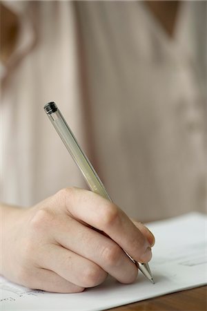 Student doing homework Stock Photo - Premium Royalty-Free, Code: 632-08227473