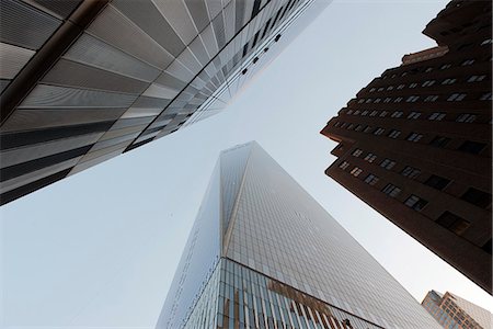 simsearch:841-03066404,k - Towering skyscrapers viewed from directly below Photographie de stock - Premium Libres de Droits, Code: 632-08227634