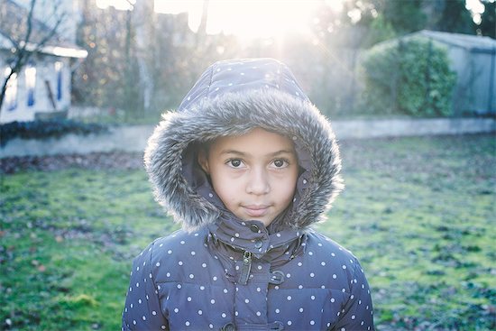 Girl wearing hooded coat, portrait Stock Photo - Premium Royalty-Free, Image code: 632-08227664