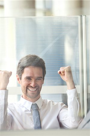 Businessman exhibiting exuberance Stock Photo - Premium Royalty-Free, Code: 632-08227665