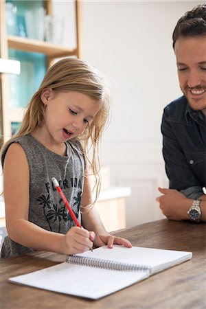 simsearch:632-08227548,k - Father watching young daugther practice writing Stock Photo - Premium Royalty-Free, Code: 632-08227840