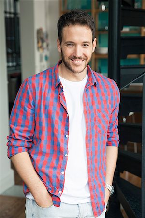 rolled up sleeves - Man with hands in pockets, portrait Stock Photo - Premium Royalty-Free, Code: 632-08331497