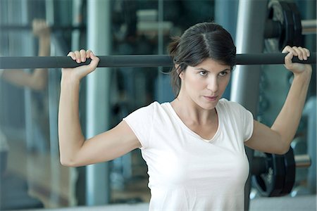 simsearch:632-08545978,k - Woman working out in health club Stock Photo - Premium Royalty-Free, Code: 632-08545942