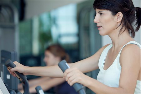 simsearch:632-08545978,k - Woman exercising in fitness club Stock Photo - Premium Royalty-Free, Code: 632-08545975