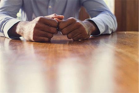 fist on table - Businessman conducting serious negotiations Stock Photo - Premium Royalty-Free, Code: 632-08886502