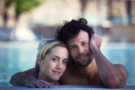 simsearch:632-08886911,k - Couple relaxing together in pool, portrait Stock Photo - Premium Royalty-Free, Code: 632-08886586