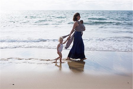 dress wading water - Mother and children walking on beach Stock Photo - Premium Royalty-Free, Code: 632-08886852