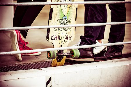 simsearch:632-01156768,k - Skateboard leaning against railing Stock Photo - Premium Royalty-Free, Code: 632-08887052