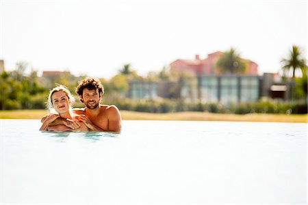 simsearch:632-08886911,k - Couple relaxing together in lake Stock Photo - Premium Royalty-Free, Code: 632-08993662