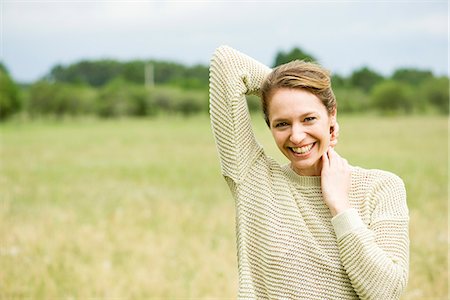 stretching outdoors - Woman massaging neck Stock Photo - Premium Royalty-Free, Code: 632-09021462